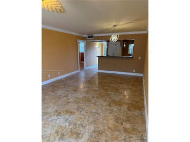 2/2 well-kept unit w/ screened-in patio & water view. Marble on Pine Island Ridge Country Club in Florida - for sale on GolfHomes.com, golf home, golf lot