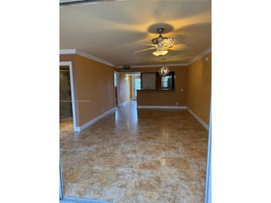 2/2 well-kept unit w/ screened-in patio & water view. Marble on Pine Island Ridge Country Club in Florida - for sale on GolfHomes.com, golf home, golf lot