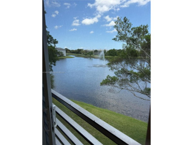 2/2 well-kept unit w/ screened-in patio & water view. Marble on Pine Island Ridge Country Club in Florida - for sale on GolfHomes.com, golf home, golf lot