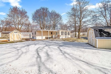 FULLY FURNISHED! Experience turn-key lake living in this on Bella Vista Golf Course in Michigan - for sale on GolfHomes.com, golf home, golf lot