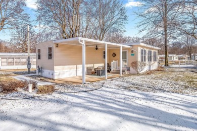 FULLY FURNISHED! Experience turn-key lake living in this on Bella Vista Golf Course in Michigan - for sale on GolfHomes.com, golf home, golf lot