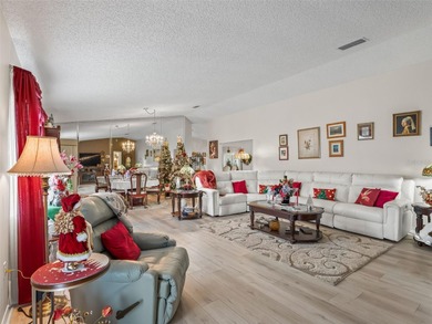 Newly Renovated Home Overlooking Golf Course, Large Water View on The Links of Spruce Creek in Florida - for sale on GolfHomes.com, golf home, golf lot