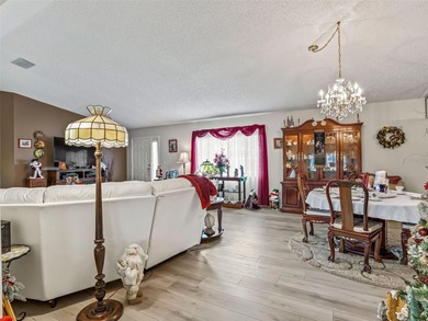 Newly Renovated Home Overlooking Golf Course, Large Water View on The Links of Spruce Creek in Florida - for sale on GolfHomes.com, golf home, golf lot