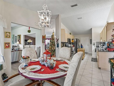 Newly Renovated Home Overlooking Golf Course, Large Water View on The Links of Spruce Creek in Florida - for sale on GolfHomes.com, golf home, golf lot