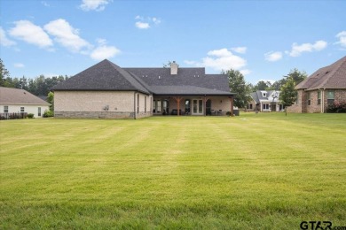 Nestled among meticulously manicured fairways in the prestigious on Hide-A-Way Lake Golf Course in Texas - for sale on GolfHomes.com, golf home, golf lot