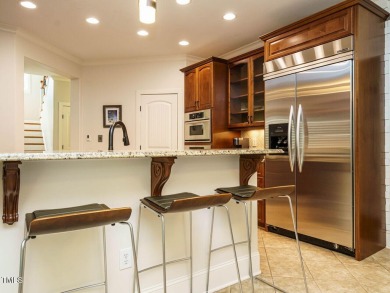 Experience refined living in this custom 4-bdrm/3-bath tucked on The Preserve At Jordan Lake Golf Club in North Carolina - for sale on GolfHomes.com, golf home, golf lot