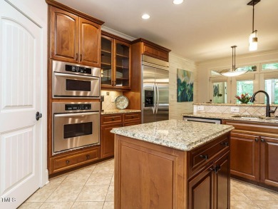 Experience refined living in this custom 4-bdrm/3-bath tucked on The Preserve At Jordan Lake Golf Club in North Carolina - for sale on GolfHomes.com, golf home, golf lot