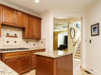 Experience refined living in this custom 4-bdrm/3-bath tucked on The Preserve At Jordan Lake Golf Club in North Carolina - for sale on GolfHomes.com, golf home, golf lot