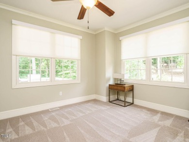 Experience refined living in this custom 4-bdrm/3-bath tucked on The Preserve At Jordan Lake Golf Club in North Carolina - for sale on GolfHomes.com, golf home, golf lot