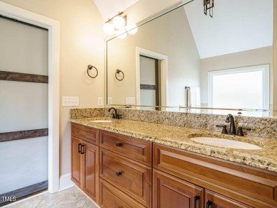 Experience refined living in this custom 4-bdrm/3-bath tucked on The Preserve At Jordan Lake Golf Club in North Carolina - for sale on GolfHomes.com, golf home, golf lot