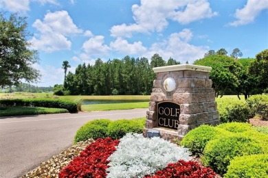 As you enter into the welcoming entry past  the dining room, you on Golf Club At North Hampton in Florida - for sale on GolfHomes.com, golf home, golf lot