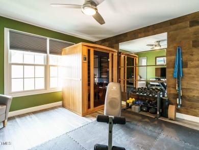 Experience refined living in this custom 4-bdrm/3-bath tucked on The Preserve At Jordan Lake Golf Club in North Carolina - for sale on GolfHomes.com, golf home, golf lot
