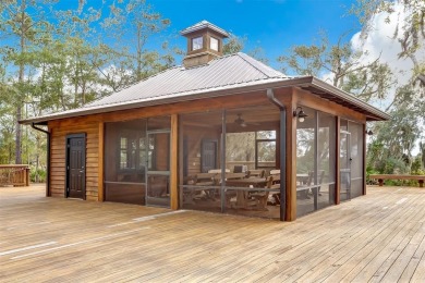 As you enter into the welcoming entry past  the dining room, you on Golf Club At North Hampton in Florida - for sale on GolfHomes.com, golf home, golf lot