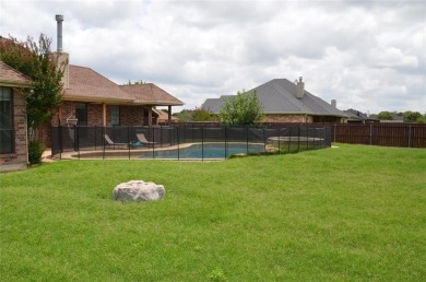 Terrific 3-Bedroom, 2-Bath Home with Pool and Outdoor Kitchen on Shady Oaks Golf Course in Texas - for sale on GolfHomes.com, golf home, golf lot