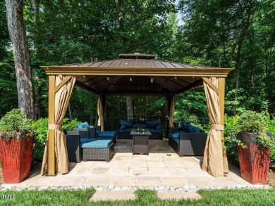 Experience refined living in this custom 4-bdrm/3-bath tucked on The Preserve At Jordan Lake Golf Club in North Carolina - for sale on GolfHomes.com, golf home, golf lot