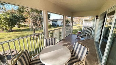 This second floor end-unit is a must see! It features a on The Glades Golf and Country Club in Florida - for sale on GolfHomes.com, golf home, golf lot