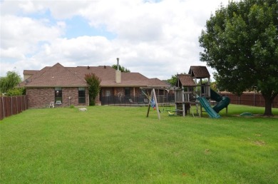 Terrific 3-Bedroom, 2-Bath Home with Pool and Outdoor Kitchen on Shady Oaks Golf Course in Texas - for sale on GolfHomes.com, golf home, golf lot