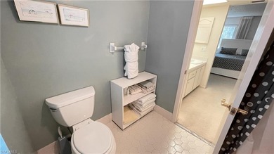 This second floor end-unit is a must see! It features a on The Glades Golf and Country Club in Florida - for sale on GolfHomes.com, golf home, golf lot