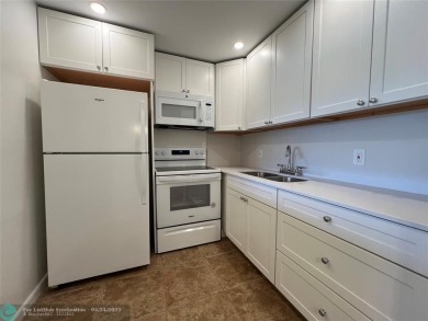 BEAUTIFULLY REMODELED 1ST FLOOR 1BEDROOM/1BATH CONDO, PERMITTED on Hillsboro Pines Golf in Florida - for sale on GolfHomes.com, golf home, golf lot