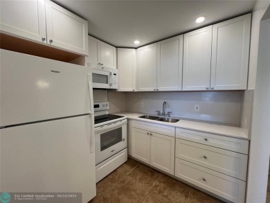 BEAUTIFULLY REMODELED 1ST FLOOR 1BEDROOM/1BATH CONDO, PERMITTED on Hillsboro Pines Golf in Florida - for sale on GolfHomes.com, golf home, golf lot