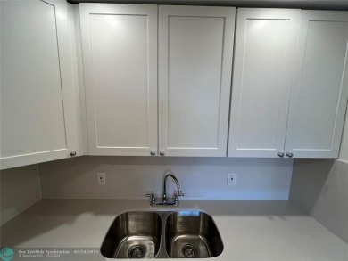 BEAUTIFULLY REMODELED 1ST FLOOR 1BEDROOM/1BATH CONDO, PERMITTED on Hillsboro Pines Golf in Florida - for sale on GolfHomes.com, golf home, golf lot