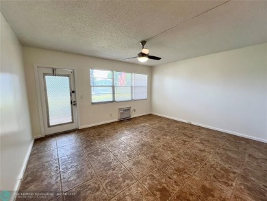 BEAUTIFULLY REMODELED 1ST FLOOR 1BEDROOM/1BATH CONDO, PERMITTED on Hillsboro Pines Golf in Florida - for sale on GolfHomes.com, golf home, golf lot