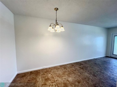 BEAUTIFULLY REMODELED 1ST FLOOR 1BEDROOM/1BATH CONDO, PERMITTED on Hillsboro Pines Golf in Florida - for sale on GolfHomes.com, golf home, golf lot