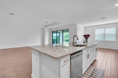 Discover refined living in this impeccably crafted home in the on Valencia Golf and Country Club in Florida - for sale on GolfHomes.com, golf home, golf lot
