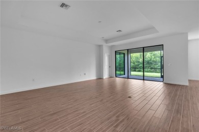 Discover refined living in this impeccably crafted home in the on Valencia Golf and Country Club in Florida - for sale on GolfHomes.com, golf home, golf lot