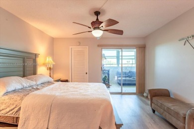 Discover a vibrant lifestyle in the 55+ community of Century on Hillsboro Pines Golf in Florida - for sale on GolfHomes.com, golf home, golf lot