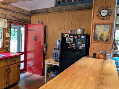 This impeccably maintained, climate-controlled, historic Log on Lucerne In Maine Golf Course in Maine - for sale on GolfHomes.com, golf home, golf lot