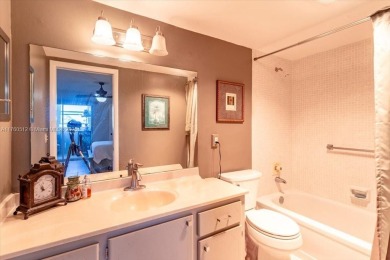 Discover a vibrant lifestyle in the 55+ community of Century on Hillsboro Pines Golf in Florida - for sale on GolfHomes.com, golf home, golf lot