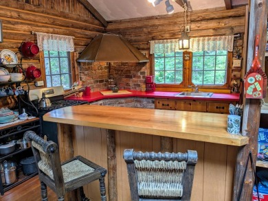 This impeccably maintained, climate-controlled, historic Log on Lucerne In Maine Golf Course in Maine - for sale on GolfHomes.com, golf home, golf lot