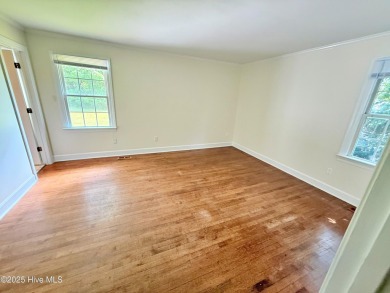 Spacious Brick Home on Nearly One Acre in Sought-After Trent on New Bern Golf and Country Club in North Carolina - for sale on GolfHomes.com, golf home, golf lot