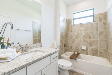 Discover refined living in this impeccably crafted home in the on Valencia Golf and Country Club in Florida - for sale on GolfHomes.com, golf home, golf lot
