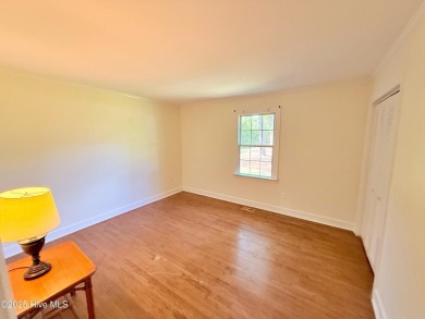 Spacious Brick Home on Nearly One Acre in Sought-After Trent on New Bern Golf and Country Club in North Carolina - for sale on GolfHomes.com, golf home, golf lot