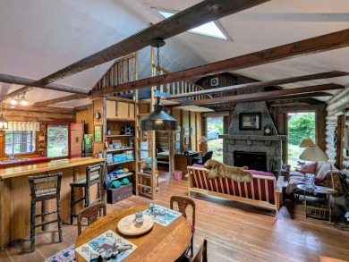 This impeccably maintained, climate-controlled, historic Log on Lucerne In Maine Golf Course in Maine - for sale on GolfHomes.com, golf home, golf lot