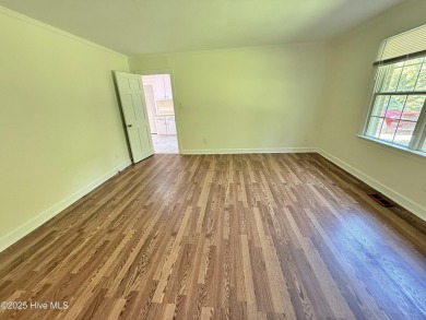 Spacious Brick Home on Nearly One Acre in Sought-After Trent on New Bern Golf and Country Club in North Carolina - for sale on GolfHomes.com, golf home, golf lot