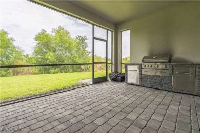 Discover refined living in this impeccably crafted home in the on Valencia Golf and Country Club in Florida - for sale on GolfHomes.com, golf home, golf lot