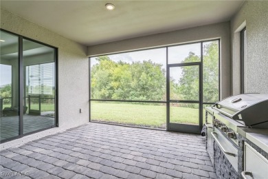 Discover refined living in this impeccably crafted home in the on Valencia Golf and Country Club in Florida - for sale on GolfHomes.com, golf home, golf lot