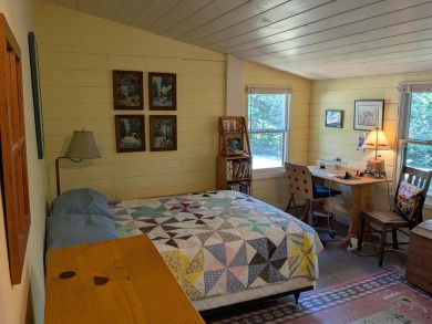 This impeccably maintained, climate-controlled, historic Log on Lucerne In Maine Golf Course in Maine - for sale on GolfHomes.com, golf home, golf lot