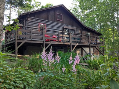 This impeccably maintained, climate-controlled, historic Log on Lucerne In Maine Golf Course in Maine - for sale on GolfHomes.com, golf home, golf lot