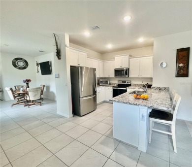 Price reduced! Welcome to this charming 3-bedroom, 2-bath Astor on Yankee Clipper Executive Golf Course in Florida - for sale on GolfHomes.com, golf home, golf lot