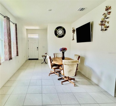 Price reduced! Welcome to this charming 3-bedroom, 2-bath Astor on Yankee Clipper Executive Golf Course in Florida - for sale on GolfHomes.com, golf home, golf lot