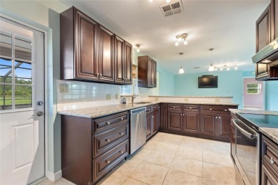 Exceptional Pool Home on 1 Acre in Indian Lake Estates - Golf on Indian Lake Estates Golf and Country Club in Florida - for sale on GolfHomes.com, golf home, golf lot