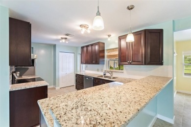 Exceptional Pool Home on 1 Acre in Indian Lake Estates - Golf on Indian Lake Estates Golf and Country Club in Florida - for sale on GolfHomes.com, golf home, golf lot