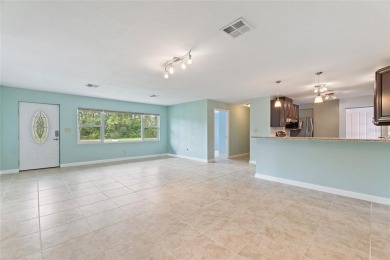 Exceptional Pool Home on 1 Acre in Indian Lake Estates - Golf on Indian Lake Estates Golf and Country Club in Florida - for sale on GolfHomes.com, golf home, golf lot