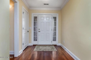Welcome Home to Westport!  Offered for sale is a pond front home on Cape Fear National At Brunswick Forest in North Carolina - for sale on GolfHomes.com, golf home, golf lot