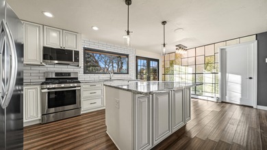 This remarkable home is located along Tiara Rado Golf Course and on Tiara Rado Golf Course in Colorado - for sale on GolfHomes.com, golf home, golf lot