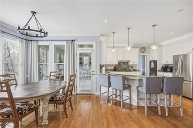 Welcome to this 5-bedroom home that sits on a corner lot and on Towne Lake Hills Golf Club in Georgia - for sale on GolfHomes.com, golf home, golf lot